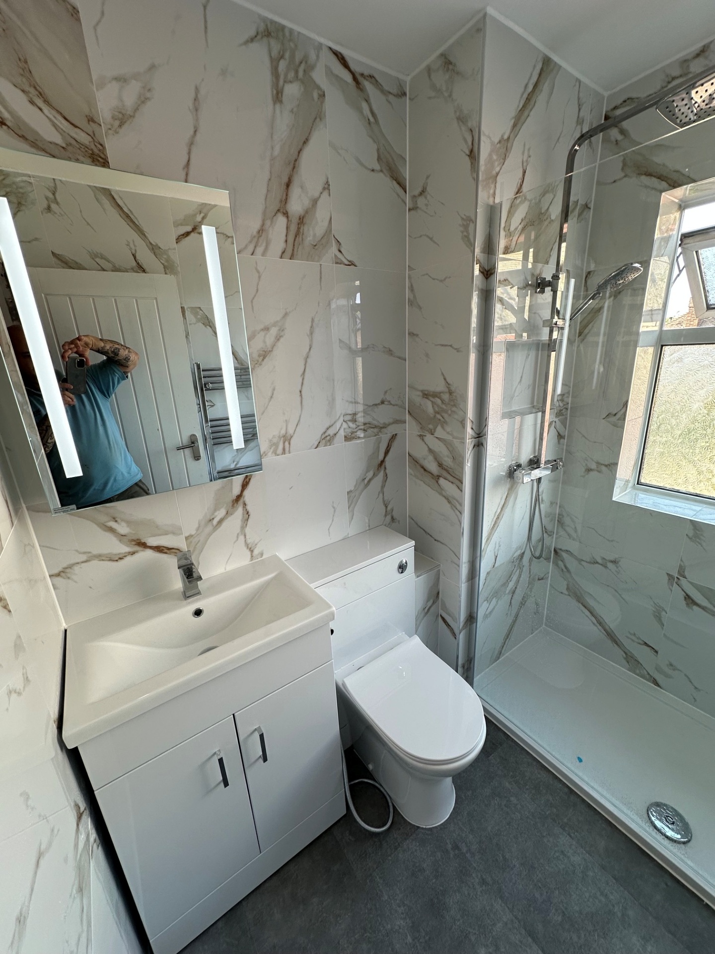 Calacatta marble shower room with vanity, WC & walk-in shower